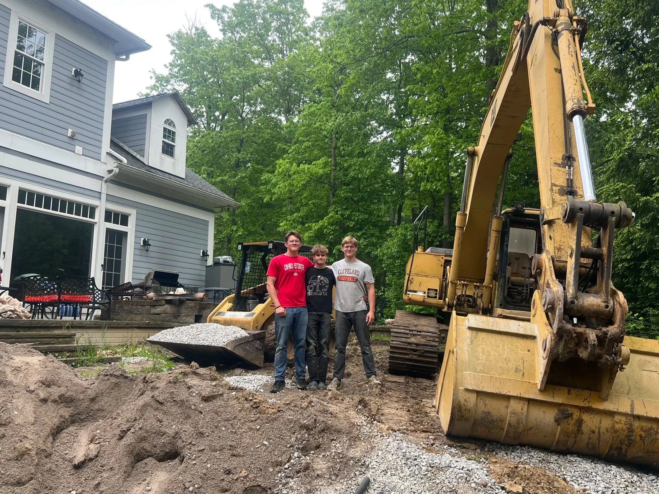 Three Brothers Landscaping team on a project site