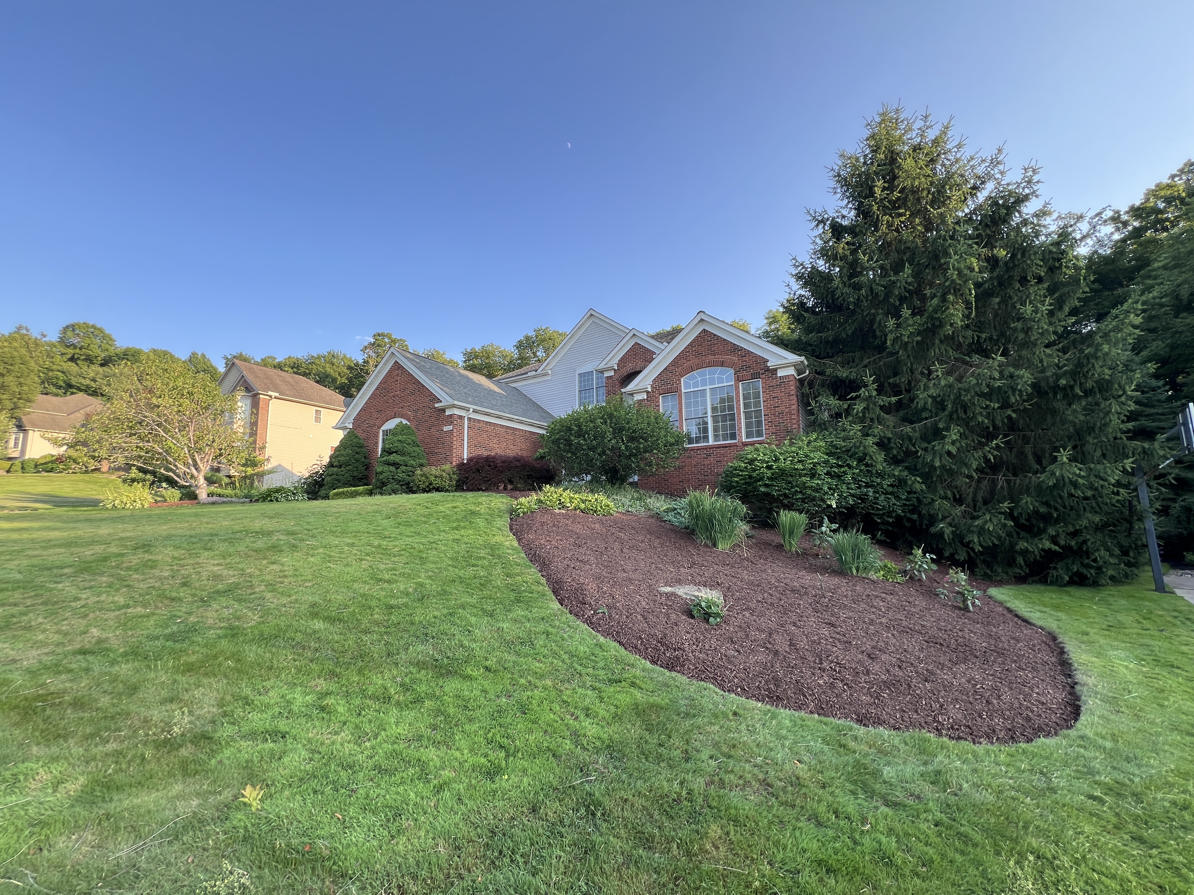 Real lawn and landscape bed maintenance by Three Brothers Landscaping